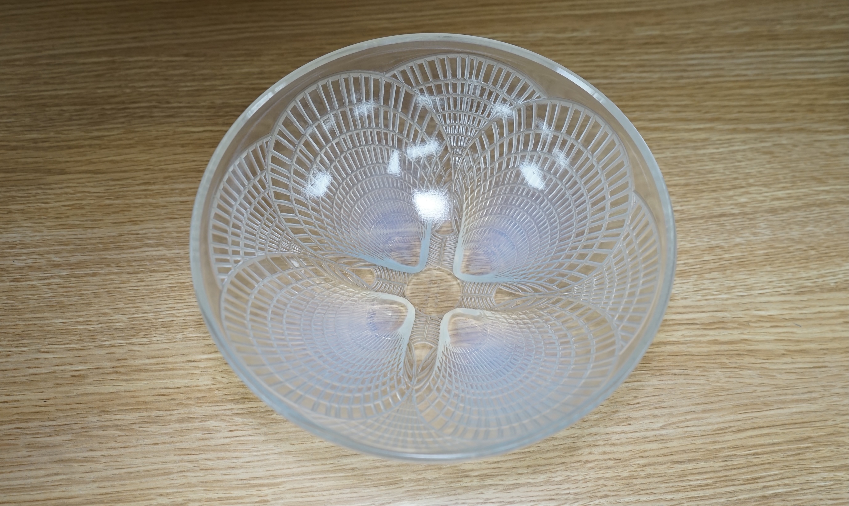 An R. Lalique coquille pattern glass bowl, no.3201, 21cm diameter. Condition - wear to base as expected, otherwise good